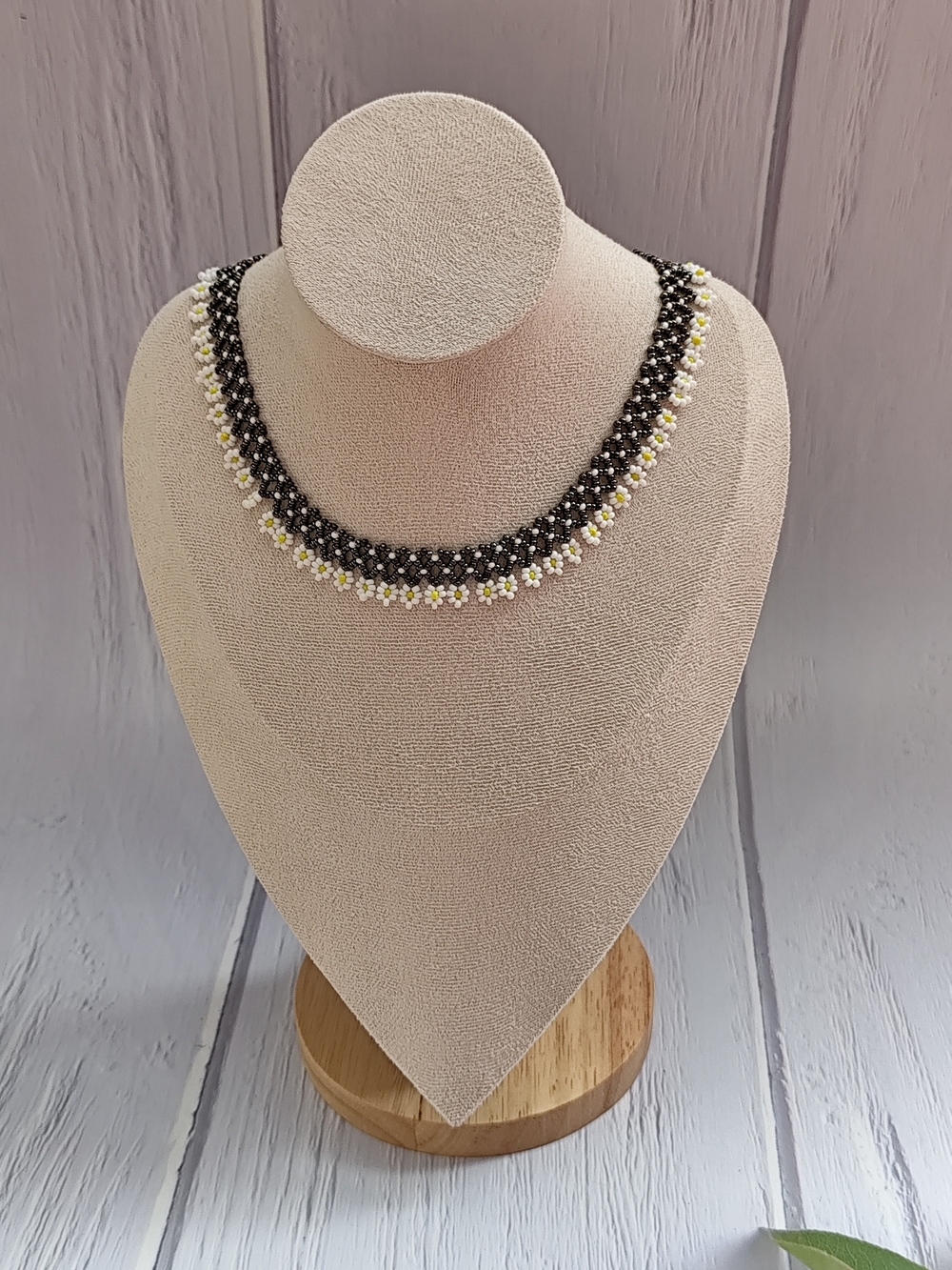 Handcrafted Black Beaded Necklace with White and Yellow Flower Accents